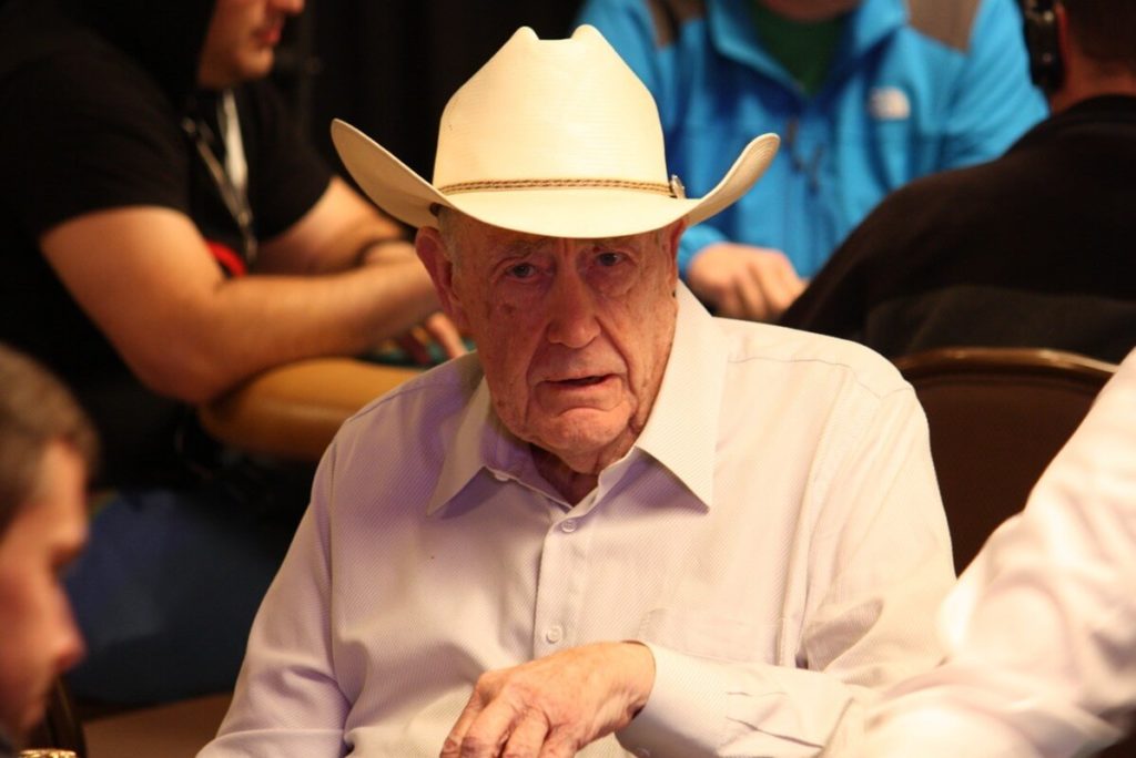 Doyle brunson wins with 10 2